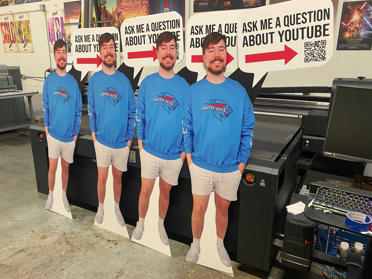 Life-size cutouts of fans