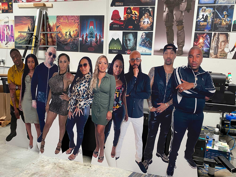 Life-size cutouts of people